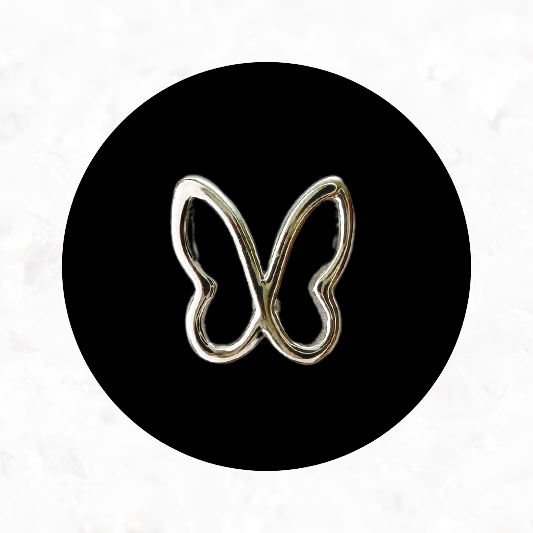 Hollow Butterfly Tooth Charm