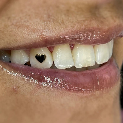 Solid Heart Tooth Charm