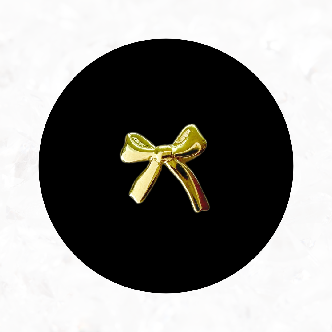 Dainty Bow Tooth Charm