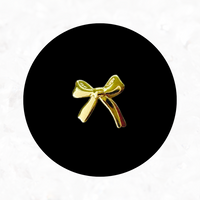 Dainty Bow Tooth Charm