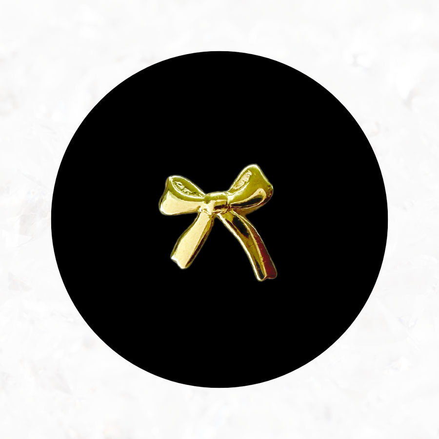 Dainty Bow Tooth Charm