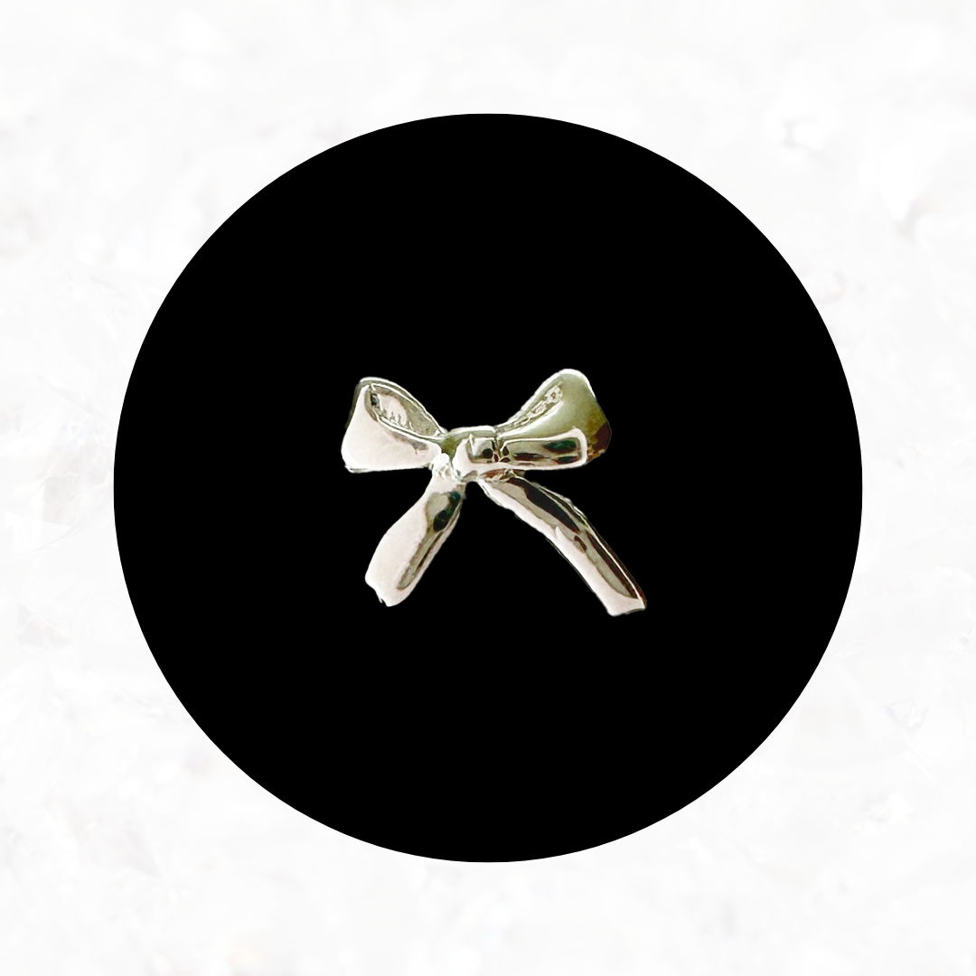 Dainty Bow Tooth Charm