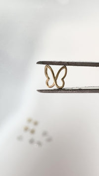Hollow Butterfly Tooth Charm