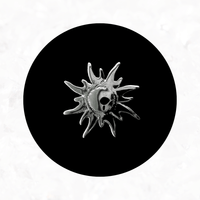 Sun Tooth Charm