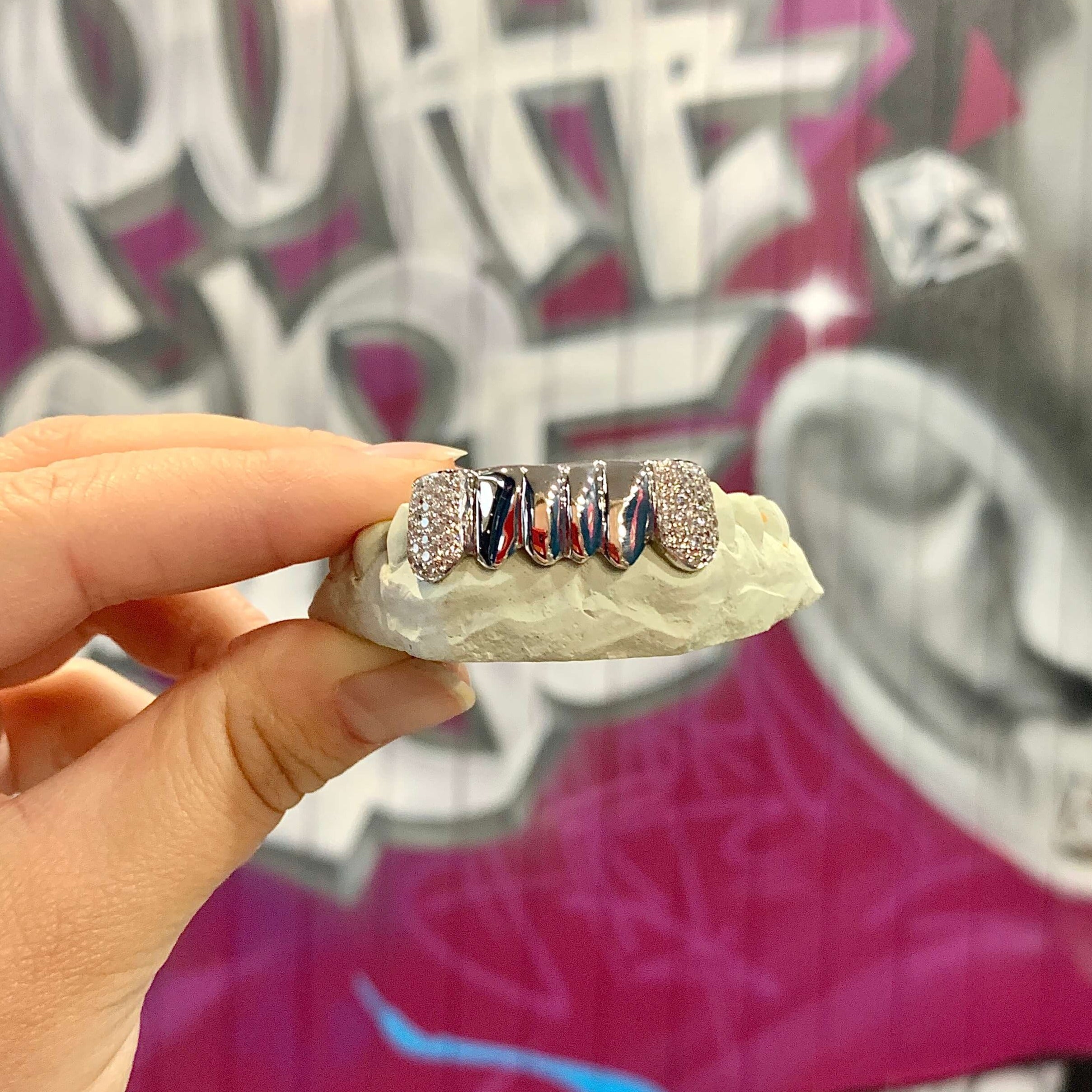 4 Solid 2 Iced Out Canines 6 Piece Grillz Set